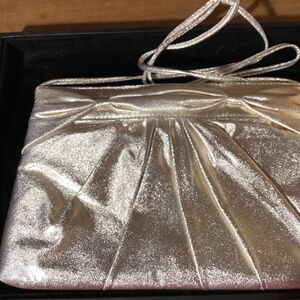 La Regale light gold metallic clutch with matching cloth shoulder strap